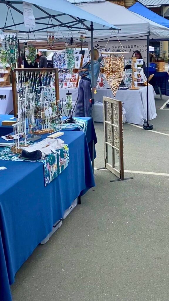 Jewelry vendors at the Moss Street Market in Victoria, BC
